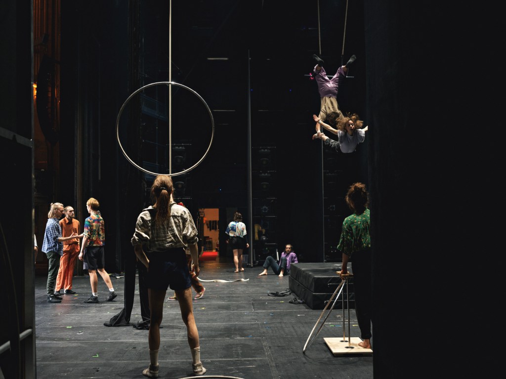 circus artist Laura Savolainen balancing a hula hoop on her head