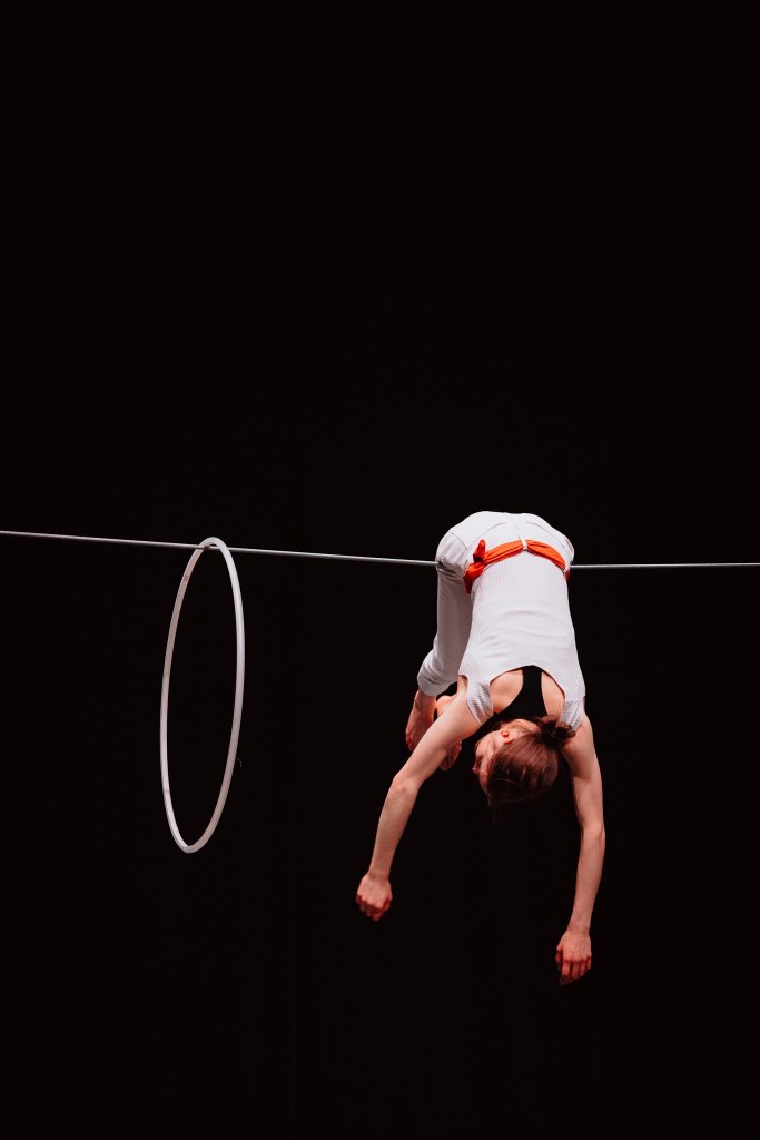 circus artist Laura Savolainen performing tightwire and hulahoops